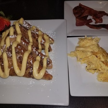 Mango Mangeaux - Mango waffles with a side of eggs and bacon - New American Near Me - Hampton, Virginia Mango Mangeaux - Mango waffles with a side of eggs and bacon - New American Near Me - Hampton, Virginia