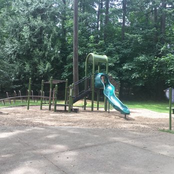 Waluga Park - East - Balancing bridge, monkey bars, slide down bar and slide - Parks Near Me - Lake Oswego, Oregon Waluga Park - East - Balancing bridge, monkey bars, slide down bar and slide - Parks Near Me - Lake Oswego, Oregon