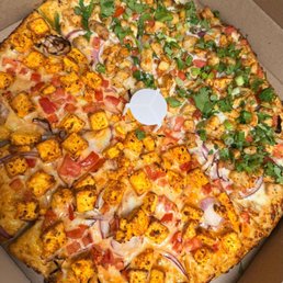Malai Paneer and Chicken Tikka Pizza. Malai Paneer and Chicken Tikka Pizza.