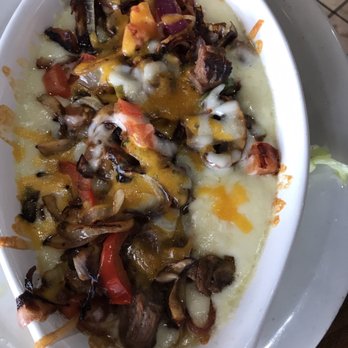 Delicias  Restaurant - Queso flameado w/fajita and veggies - Latin American Near Me - Houston, Texas