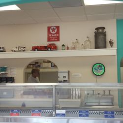 Front counter with a window to where the magic happens