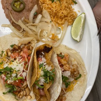 Jose's Tacos - Soft flour chicken and Shrimp taco on either end, with crunchy chorizo taco in the middle + side of rice and beans - Tacos Near Me - Detroit, Michigan Jose's Tacos - Soft flour chicken and Shrimp taco on either end, with crunchy chorizo taco in the middle + side of rice and beans - Tacos Near Me - Detroit, Michigan