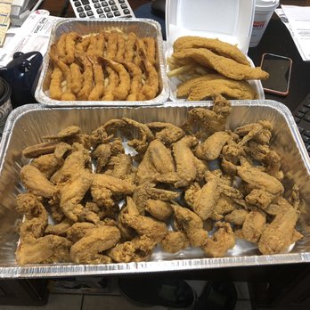 Super Sharks - two trays of fried chicken and french fries - Chicken Wings Near Me - Chicago, Illinois Super Sharks - two trays of fried chicken and french fries - Chicken Wings Near Me - Chicago, Illinois