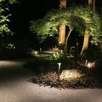 Gray's Landscaping - a pathway at night - Landscaping Near Me