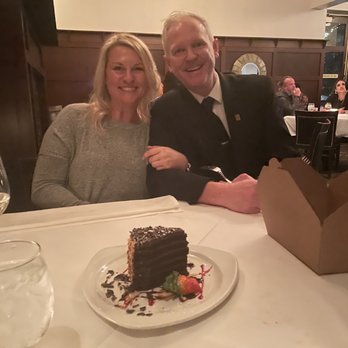 III Forks - Our wonderful server and the best chocolate cake!! - Steakhouses Near Me - Austin, Texas III Forks - Our wonderful server and the best chocolate cake!! - Steakhouses Near Me - Austin, Texas