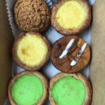 CA Bakehouse - Durian Choux $3 (top left).  Portuguese Egg Tart $2.25 (yellow).  Guava Mochi Cake $2.50 (middle right).  Kaya Egg Tart $2.50 (green). - Bakeries Near Me - San Jose, California