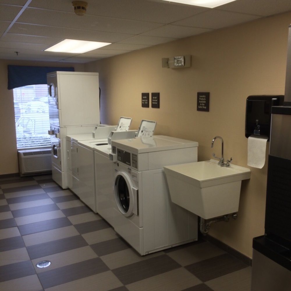 Hampton Inn Williamsport-Downtown - The best laundry room ever at a hotel. On opposite wall is leather sofa and long table to fold clothes - Hotels Near Me - Williamsport, Pennsylvania Hampton Inn Williamsport-Downtown - The best laundry room ever at a hotel. On opposite wall is leather sofa and long table to fold clothes - Hotels Near Me - Williamsport, Pennsylvania