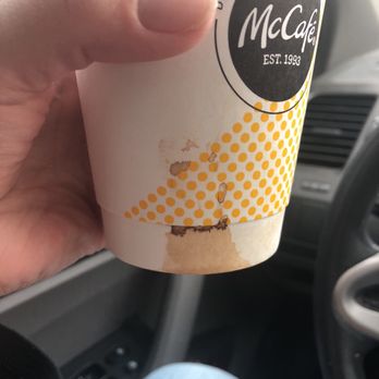 McDonald's - a hand holding a cup of coffee - Burgers Near Me - West Memphis, Arkansas McDonald's - a hand holding a cup of coffee - Burgers Near Me - West Memphis, Arkansas