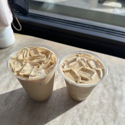 Nossa Familia Coffee - Butterscotch Black Sesame Latte and Vanilla Latte