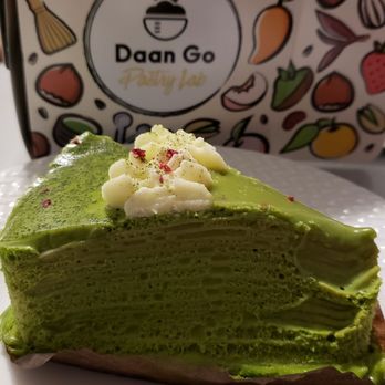 Daan Go Cake Lab - Matcha crepe cake slice (melted a bit on the drive home) - Desserts Near Me - Toronto, Ontario
