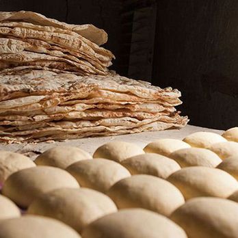 Mega Donair - a stack of flatbreads on a table - Donairs Near Me - Port Moody, British Columbia Mega Donair - a stack of flatbreads on a table - Donairs Near Me - Port Moody, British Columbia