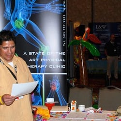 Peak Motion Physical Therapy - Owner Phil Baca Prepares for a presentation