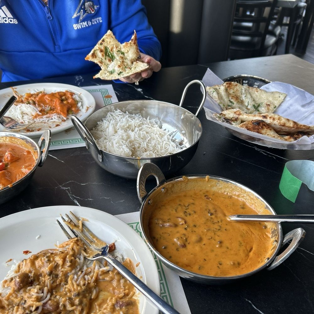 Everest Bistro - This Tiki Masala, rice, garlic naan and Dal Makhani - Indian Near Me - Charlotte, North Carolina Everest Bistro - This Tiki Masala, rice, garlic naan and Dal Makhani - Indian Near Me - Charlotte, North Carolina