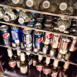 Complimentary drinks while you wait for your cut.