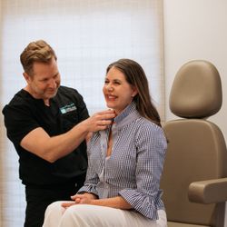 Carolina Facial Plastics - Dr. Kulbersh with a patient