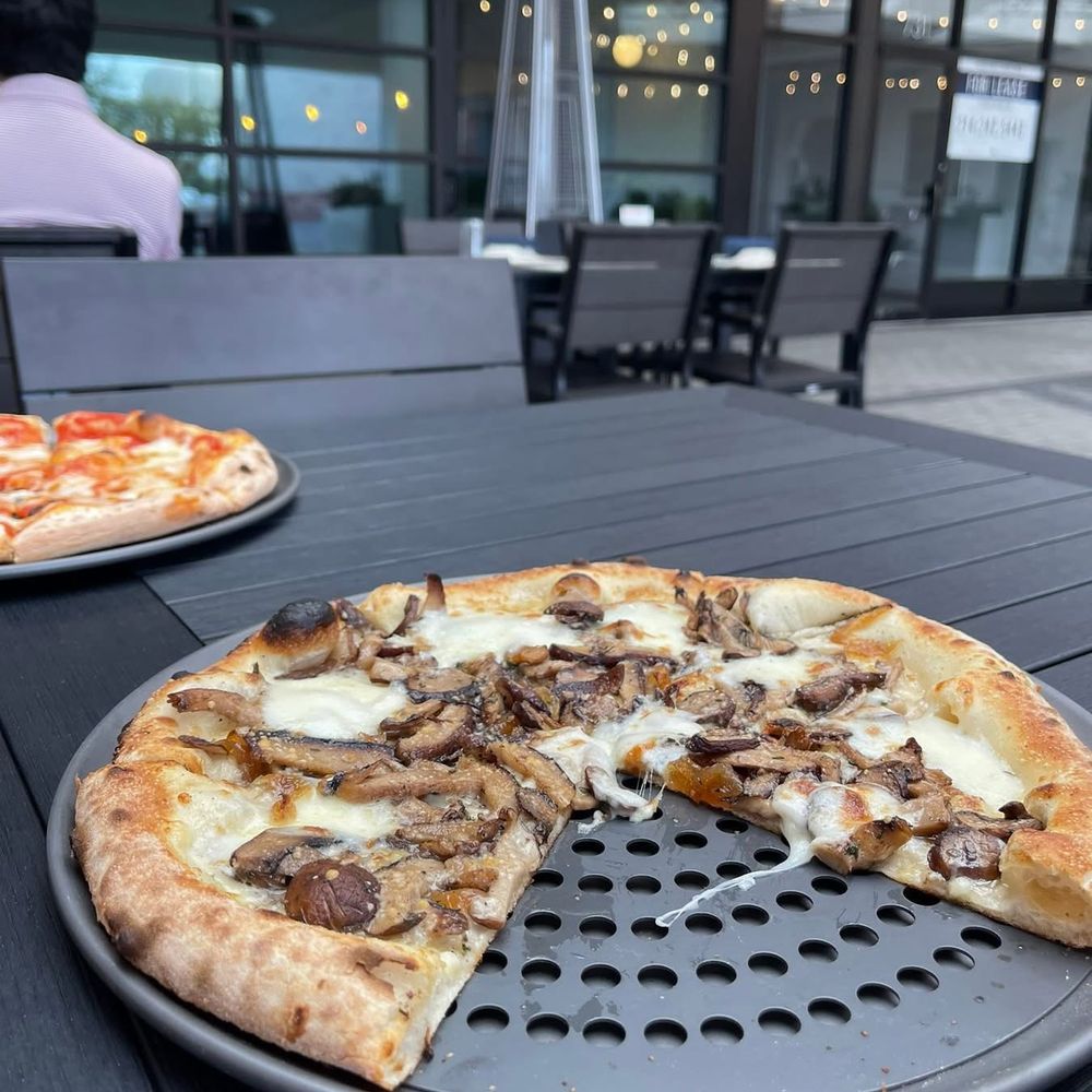 Pizzana - Preston Forest - The delicious authentic pizza served to us outside on the patio. They even have heaters ready to go when the temperature gets colder. - Italian Near Me - Dallas, Texas Pizzana - Preston Forest - The delicious authentic pizza served to us outside on the patio. They even have heaters ready to go when the temperature gets colder. - Italian Near Me - Dallas, Texas