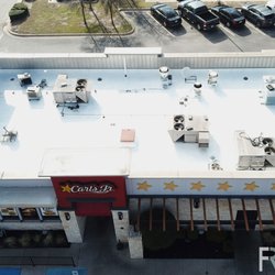 Fiducia Roofing & Restoration - White energy star fluid applied elastomeric roof coating restoration. Commercial roofer