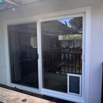 Select Home Improvements - Family Room Sliding Glass Door with Large Doggie Door - Windows Installation Near Me