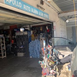 Apollo Auto Alarm & Sound System - Paul working away with his tools