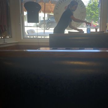 Golden Rooster Restaurant - Cleaning tables without mask properly worn. - American Near Me - Saco, Maine Golden Rooster Restaurant - Cleaning tables without mask properly worn. - American Near Me - Saco, Maine