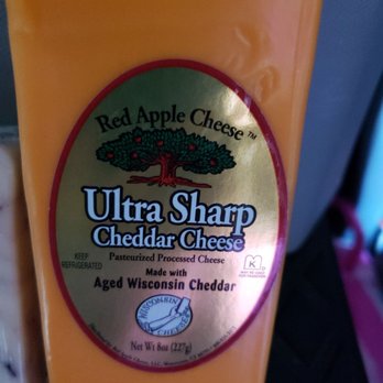 Log Cabin Deli & Market - a bottle of ultra sharp cheddar cheese - Cheese Shops Near Me - Mauston, Wisconsin
