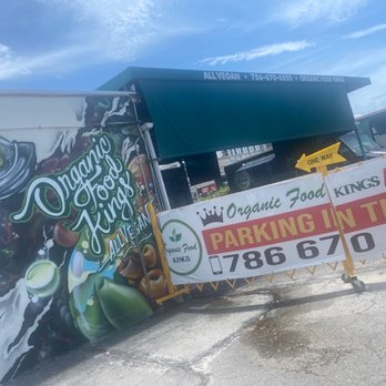 Organic Food Kings - a truck parked in front of a building - Vegan Near Me - Miami, Florida Organic Food Kings - a truck parked in front of a building - Vegan Near Me - Miami, Florida
