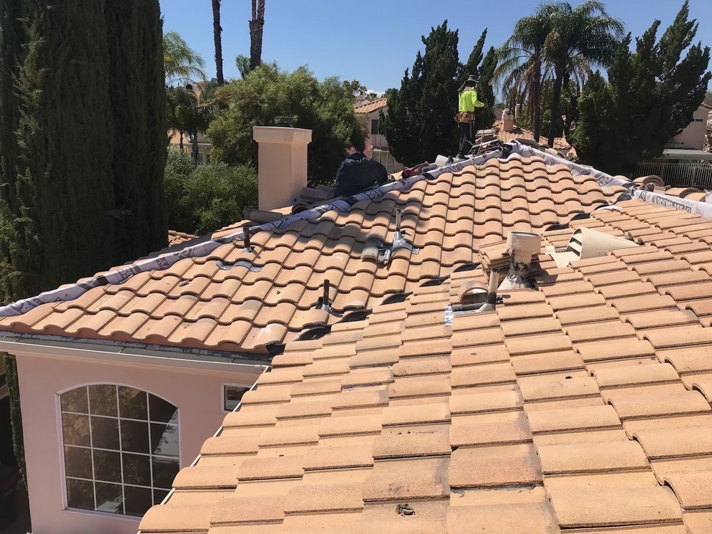 Slide of Imperial Roofing