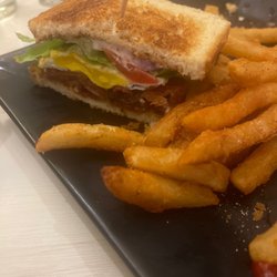 Great American Grill - BLT with egg and fries.