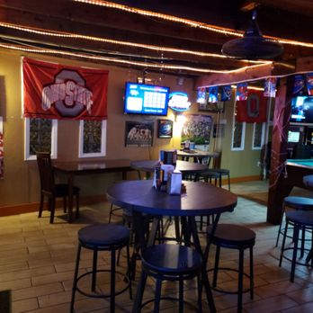 4 Points Bar - tables and stools in a bar - Pubs Near Me - Sandusky, Ohio