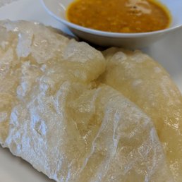 Palata (house made layered bread served with curry) Palata (house made layered bread served with curry)