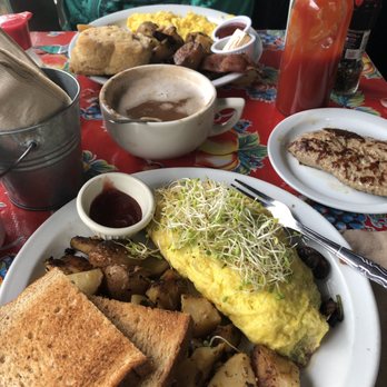 Howard Station Cafe - Veggie omelet, no cheese, avocado inside, potatoes, toast and jam. The side is chicken apple sausage. My mocha with coconut milk was tasty! - Juice Bars & Smoothies Near Me - Occidental, California