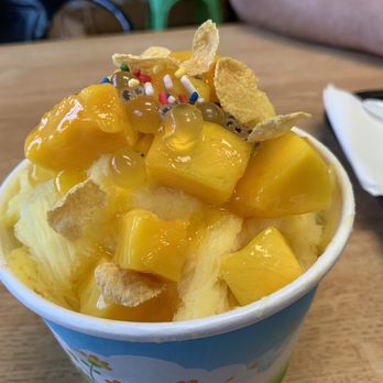 Sunshine Ice - Mango on mango base snow ice - Juice Bars & Smoothies Near Me - Weehawken, New Jersey