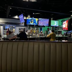 Chive - Inside. Very long booths and a wrap around bar.