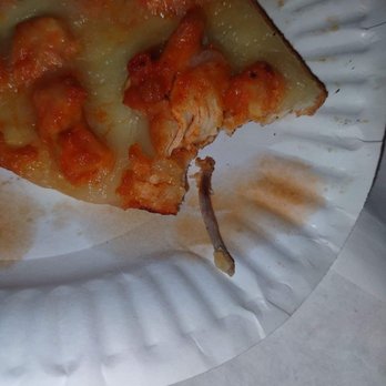 Rocco's Pizzeria - a slice of pizza on a paper plate - Pizza Near Me - Mount Sinai, New York