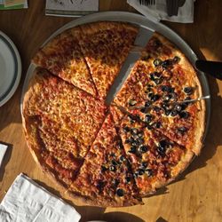 Christos' Pizza and Pasta - 18" pizza half plain cheese and half olives and bacon.