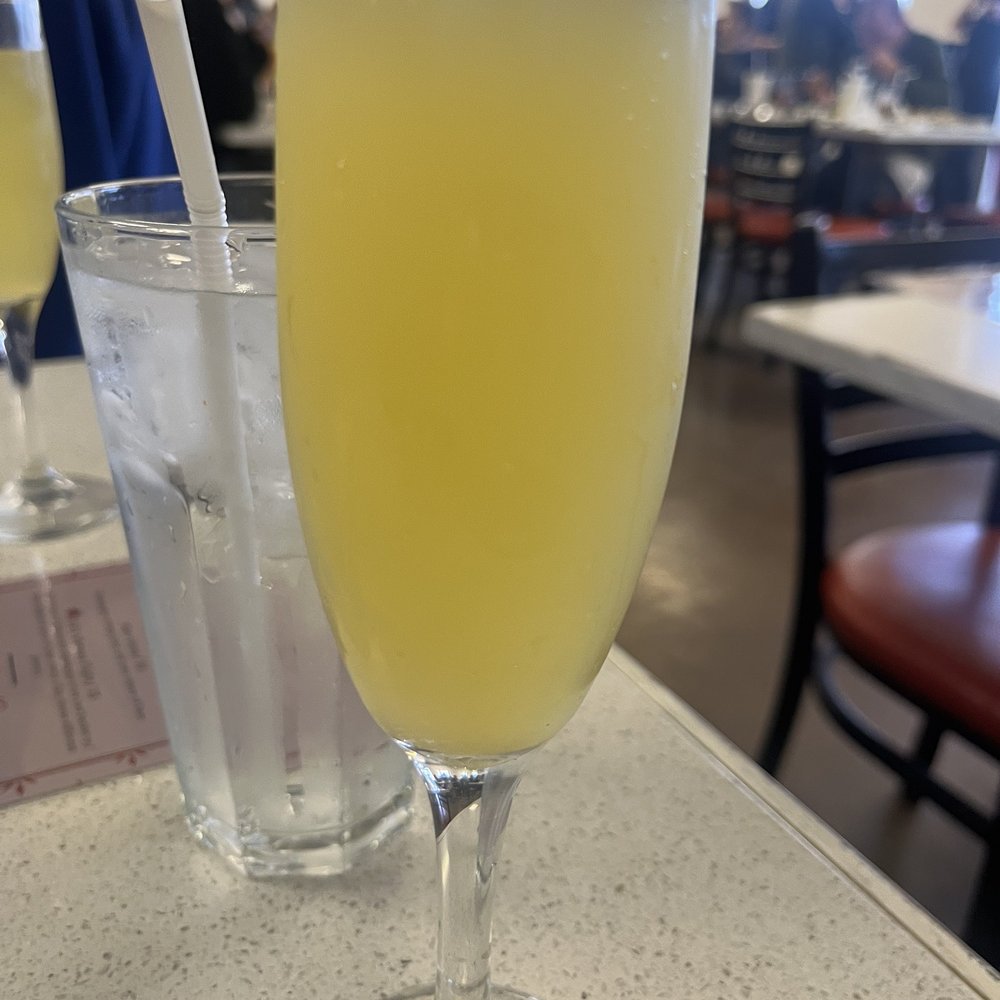 Ale's Kitchen - Pineapple mimosa. - Breakfast & Brunch Near Me - Midlothian, Texas