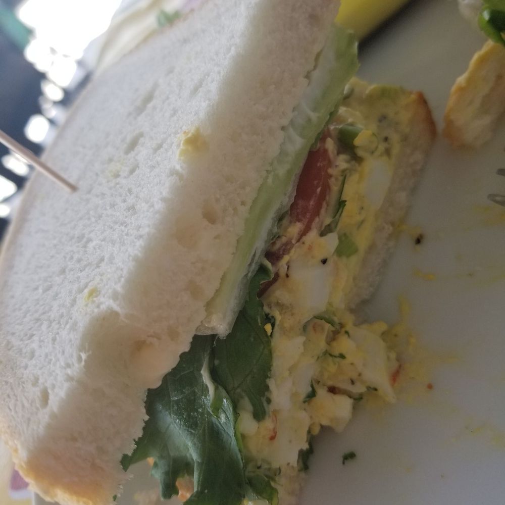 Redbud Cafe - Egg salad sandwich with green olives and green onions on rustic white bread. - Cafes Near Me - Blanco, Texas Redbud Cafe - Egg salad sandwich with green olives and green onions on rustic white bread. - Cafes Near Me - Blanco, Texas