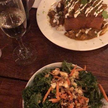 Nue - Syrian Kale and Carrot Salad South African Bunny Chow - Tapas/Small Plates Near Me - Seattle, Washington Nue - Syrian Kale and Carrot Salad South African Bunny Chow - Tapas/Small Plates Near Me - Seattle, Washington
