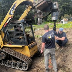 MD Electric & Solar - Driving the ground screws