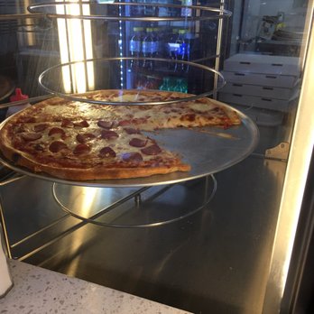Carmine's Pizzeria - Pizza by the slice - Pizza Near Me - Calgary, Alberta