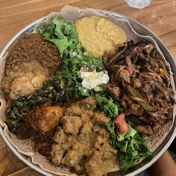 Cafe Colucci - Meat Combination Platter with Begue Tibs (Lamb) - Ethiopian Near Me - Oakland, California Cafe Colucci - Meat Combination Platter with Begue Tibs (Lamb) - Ethiopian Near Me - Oakland, California