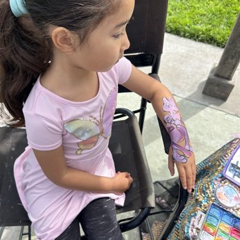 Shooting Star Face Painting - Mewtwo Pokémon paint in process - Face Painting Near Me Shooting Star Face Painting - Mewtwo Pokémon paint in process - Face Painting Near Me