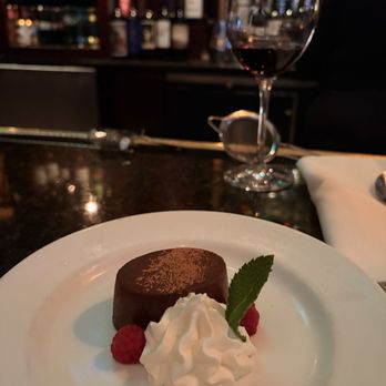 The Capital Grille - Desert..flourless chocolate cake with Caymus wine - Steakhouses Near Me - Milwaukee, Wisconsin The Capital Grille - Desert..flourless chocolate cake with Caymus wine - Steakhouses Near Me - Milwaukee, Wisconsin