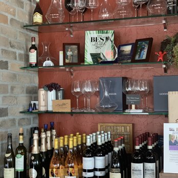 The Wine Store - bottles of wine and wine glasses - Wineries Near Me - Naples, Florida