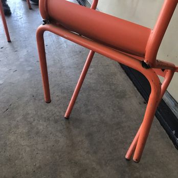 QDOBA Mexican Eats - Red chair collapsed back legs against glass wall - Mexican Near Me - Walnut Creek, California QDOBA Mexican Eats - Red chair collapsed back legs against glass wall - Mexican Near Me - Walnut Creek, California