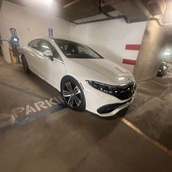 The Guild North Hollywood - Car recharging in handicapped designated parking space. - Apartments Near Me - North Hollywood, California