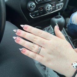 Adore Nail Spa - The "long"nails they upcharged her for!