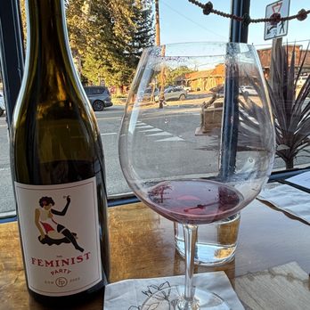Clementine Carter Wines - Tasting the 2022 "Feminist Party" GSM. They also sell t-shirts with this logo...my wife bought one! - Wine Tasting Room Near Me - Los Alamos, California