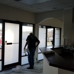 Hendersonville Window Tinting - Installing Clear Frost window film for some privacy.