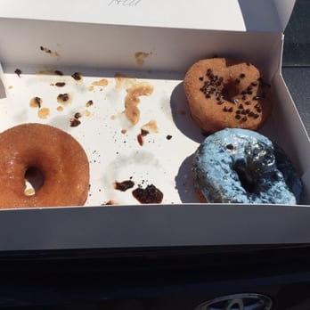 Fractured Prune - Had to start before the picture was taken. The blue one is a blueberry glaze donut. - Coffee & Tea Near Me - Rehoboth Beach, Delaware Fractured Prune - Had to start before the picture was taken. The blue one is a blueberry glaze donut. - Coffee & Tea Near Me - Rehoboth Beach, Delaware